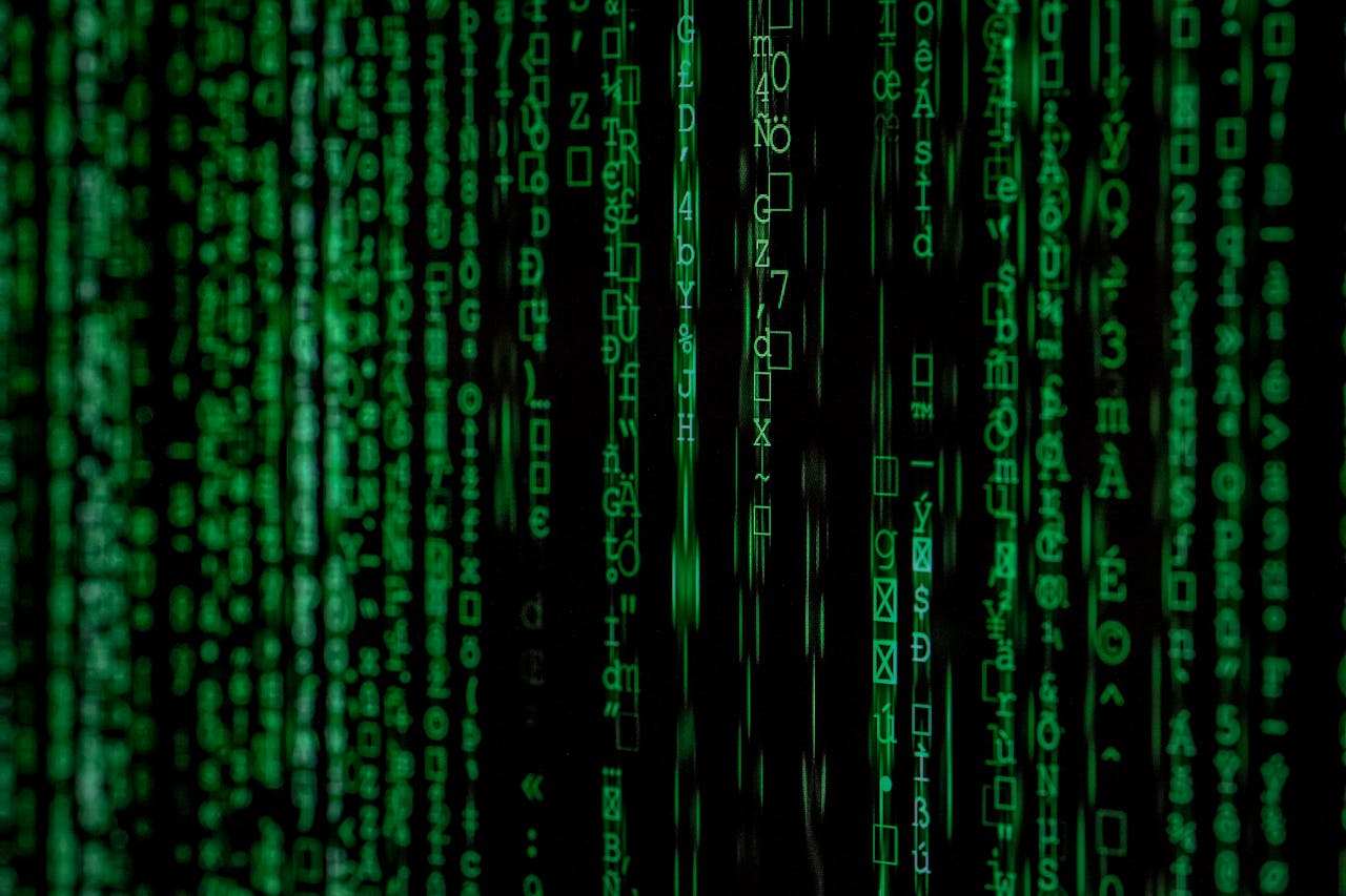 Home Abstract green matrix code background with binary style.